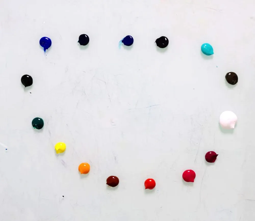 Mixed paint laid out on a palette