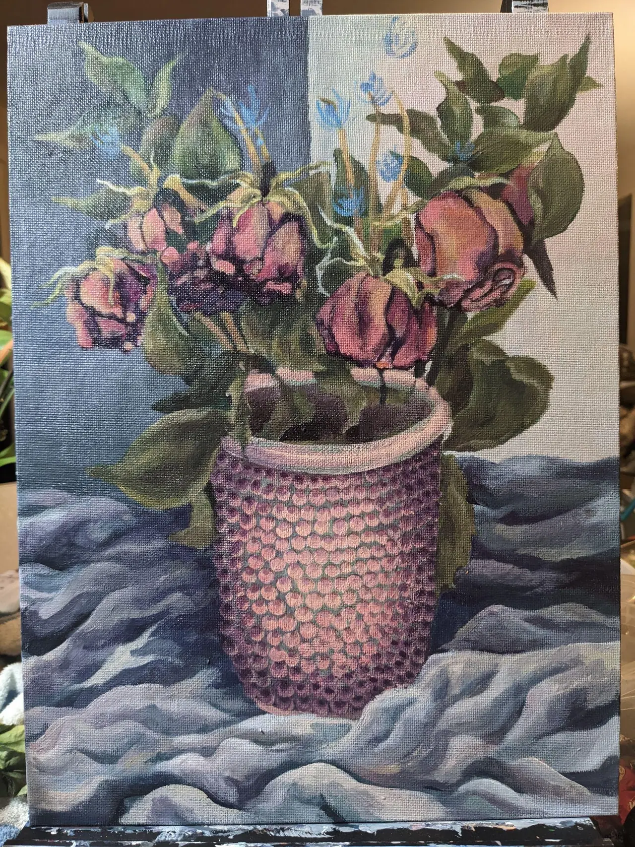 Early still life painting of dried roses in a pink vase