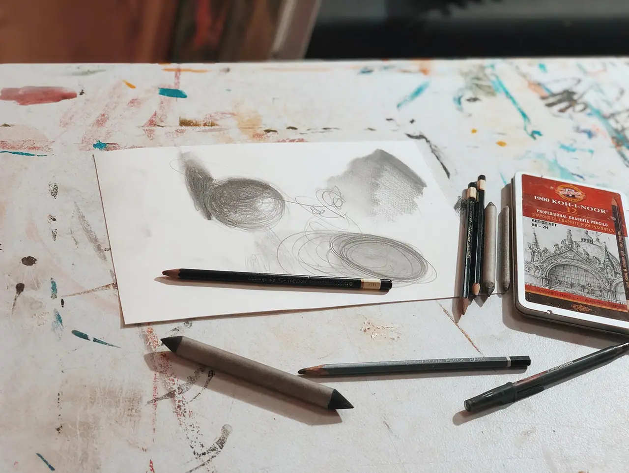 A raw canvas being primed with white gesso to create a smooth surface for paint