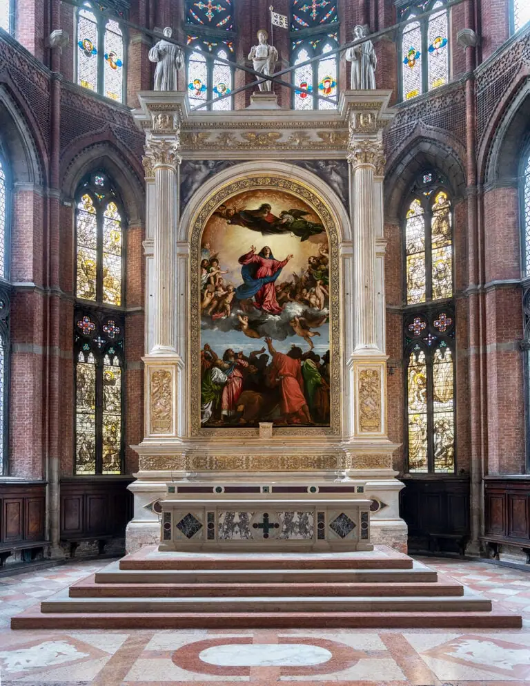 Assumption of the Virgin by Titian, the Virgin Mary in red robes rising toward golden light above the apostles