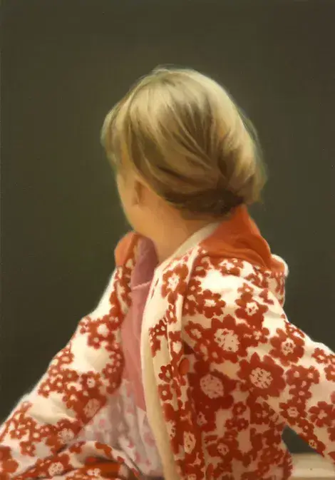 Gerhard Richter painting Betty showing a woman in a red and white sweatshirt turned away from the viewer