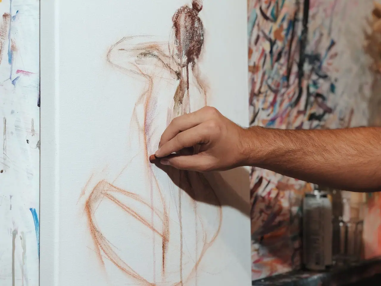 Conte crayon figure drawing showing soft edges, varied contour, and a full range of values