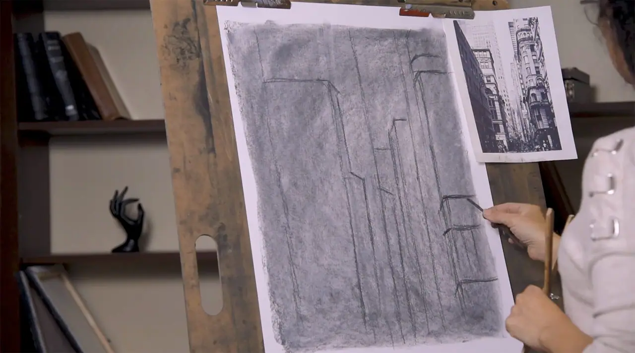 Darker charcoal marks added back over a subtractive drawing to push values toward the darkest tones