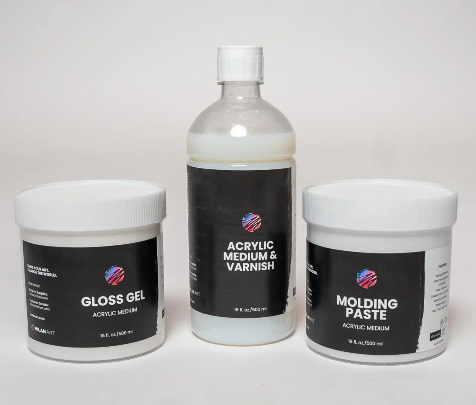 Bottles of acrylic mediums used for thinning and glazing acrylic paint